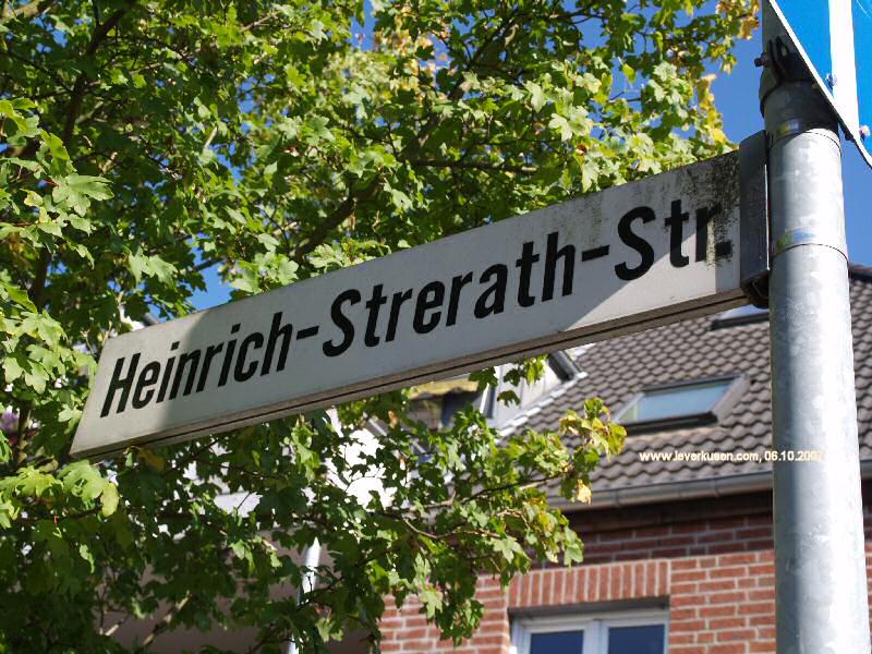 Foto der Heinrich-Strerath-Str.: Straßenschild Heinrich-Strerath-Str.