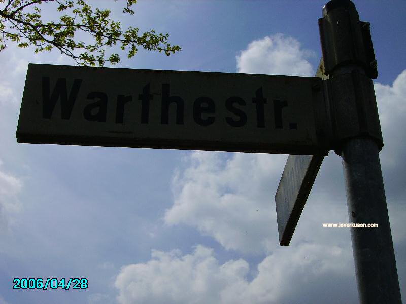 Foto der Warthestr.: Straßenschild Warthestr.