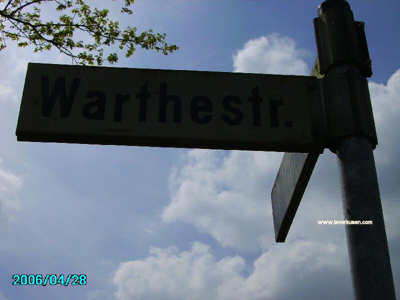 Foto der Warthestr.: Straßenschild Warthestr. Foto der Warthestr.: Straßenschild Warthestr.