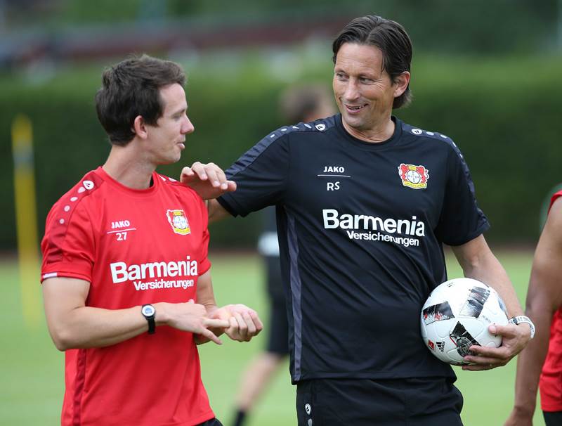 Roger Schmidt und Robbie Kruse